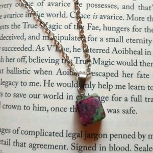 Irregular natural ruby in zoisite pendant